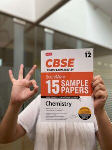 person loving the scoremore sample paper class 12 chemistry book